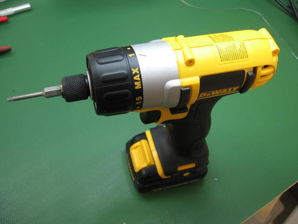 We use a small DeWalt drill with low torque setting to insert screws.