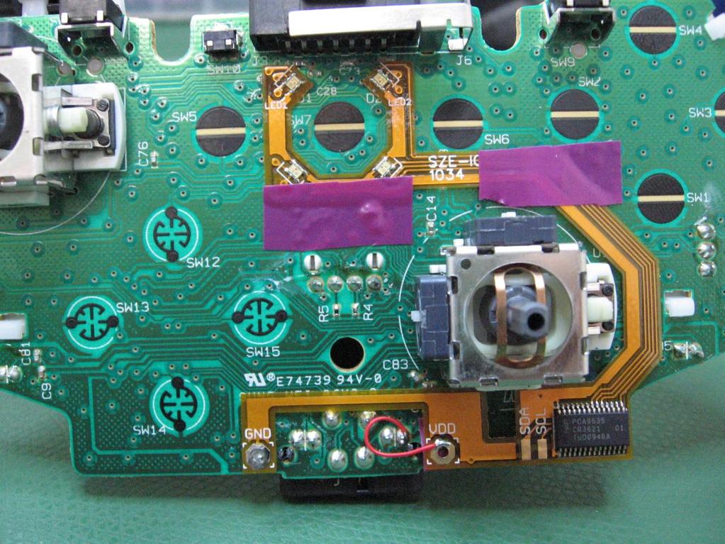 Solder the flexible add-on board at the GND and VDD solder points. Then use electrical tape to secure the add-on board in place.