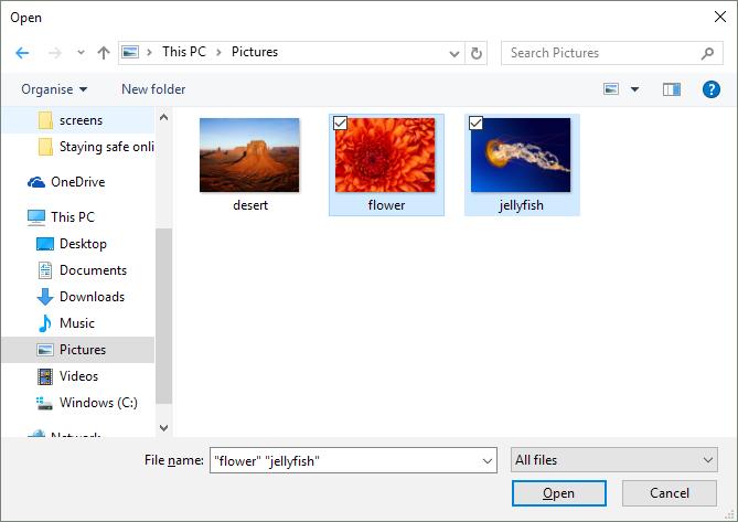 ATTACHING A FILE TO AN EMAIL A quick tip: you can easily attach multiple files here by holding down the Ctrl button and clicking on the photos you want to attach one by one.