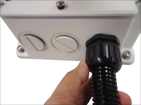 conduit is not included in the package) and through one of the holes of the junction box. Then connect the necessary cables.