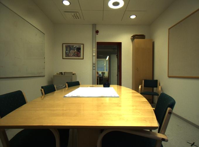 2 Saurer et al. Fig. 1. Two images from the location class Meetingroom on different floors.
