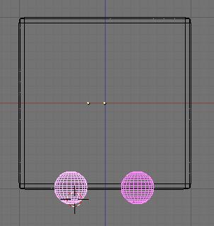 This is the side of the die that will have 2 dots. Select both spheres then press the MKEY (Layer Menu).