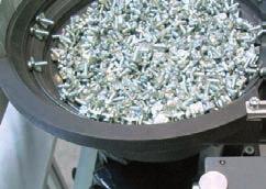 For counter-sunk head screws especially, vibratory bowl feeders are a functional solution.