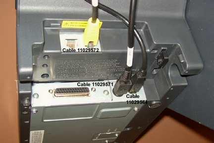 Figure 7, H6000IV Rear Panel 2. Place the printer on the printer tray, running the cables through the mouse hole on the printer s side.
