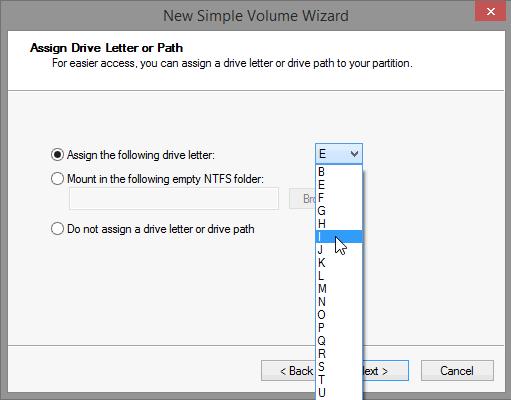 c. Type 2000 in the Simple volume size in MB field, and then click Next. d. Click the Assign the following drive letter: radio button. Select I from the drop-down menu, then click Next.