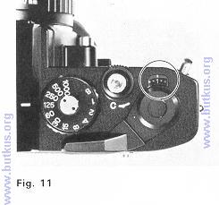 8. Advance Film Advance Lever ( 11 ) two or three times. after depressing Shutter Release Button (9) each time. until the number 1 is opposite the index line in Exposure Counter (1,3) (Fig.