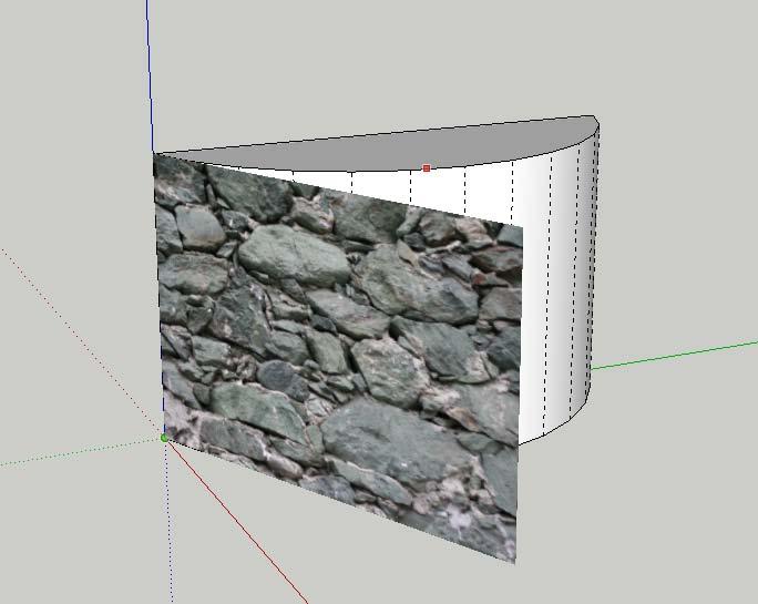 This example will show how to map a new image as a texture to a curved surface: 1. Choose View, Hidden Geometry to turn on Hidden Geometry so you can see the individual faces in your model 2.
