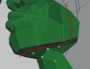 This enables a loop (highlighted in red) to continue up over the nose while accommodating the extra polygons for the nostril area. The cage object is called FaceNose.