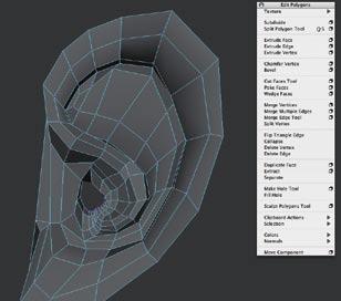 Using the same technique with which you 6 began the ear, create an n-gon where you want the ear-hole to be then extrude it inwards a few times moving and rotating as you go.