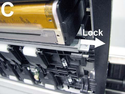 While lightly pressing up on the Guide; slide it to the left, until the cutouts in the Guide aligned with the ears on the back side of the metal Support plate.