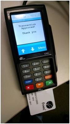 8. Remove the card once the Transaction Approved