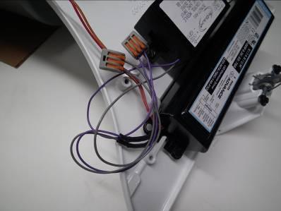7. Locate the dimming driver/ballast 0-10V input wires (violet and grey) and determine the type of termination needed.
