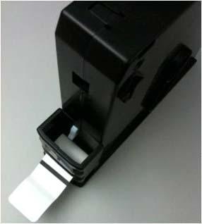 Reinsert the wristband cartridge in your HC100 printer; the remaining wristband should feed out.