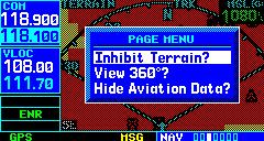 NAVCOM PAGE TO INHIBIT TERRAIN: 1) Select the TERRAIN Page and press the MENU Key. Inhibit Terrain? is selected by default.