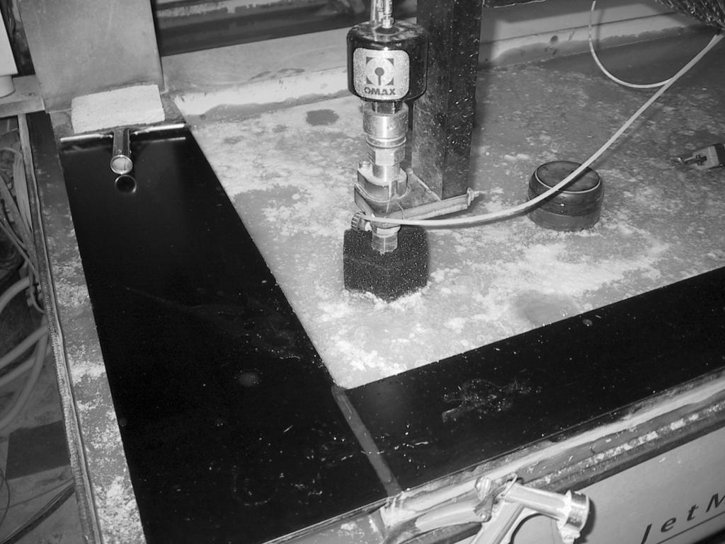 digitalfabrication >> Axel Kilian Figure 10. Cutting of the polycarbonate pieces in an OMAX water jet cutter Figure 11.