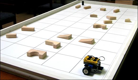 Using a large scale printer, we have printed a grid for the GridWalker to roam around in that is the physical embodiment of the occupancy grid the GridWalker will use when computing its movements.