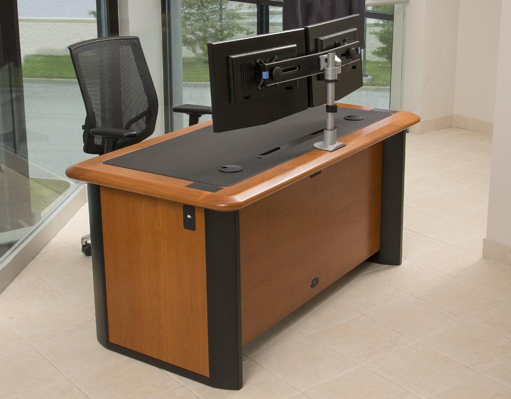 The Traditional Computer Desk has an integrated twelve position power strip and cable tray.
