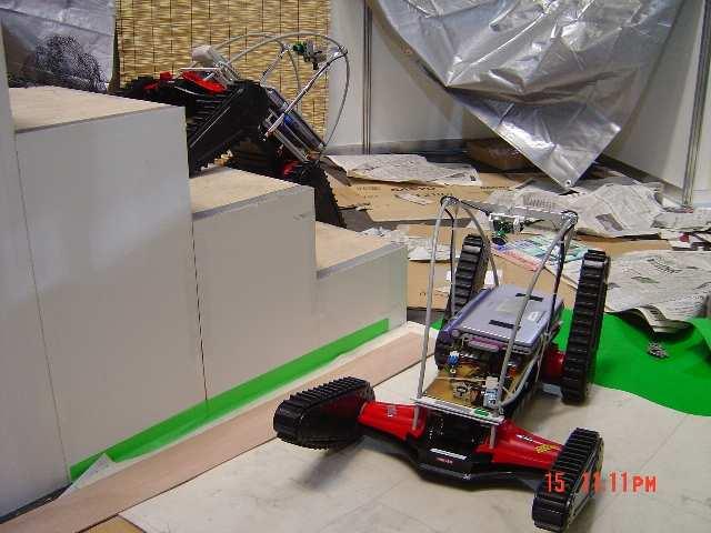 (a) (b) (c) Fig. 7. Robots built by our team. (a) The Lurker robot and (b) the Zerg robot during the RoboCup competition in Osaka.