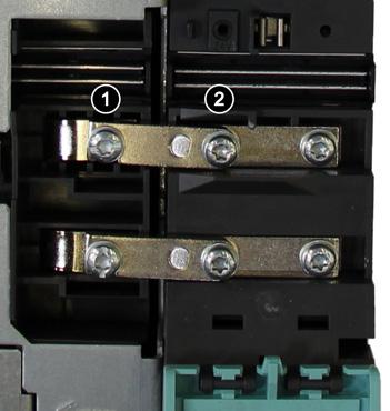 Install the lower and upper DC link busbars. Install the lower DC link busbar Install the upper DC link busbar Release the screws. Turn over the DC link bridge.
