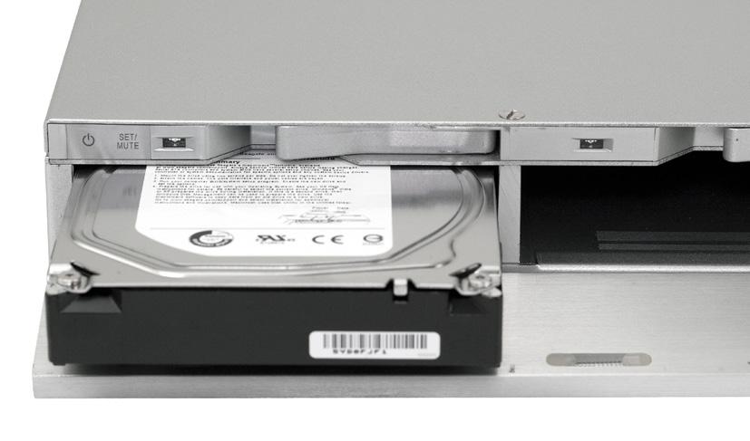 Install the drive as shown to the right, with the SATA connector facing away from you. 3. Slide the drive all the way into the drive bay. It will fit flush with the aluminum frame. 4.