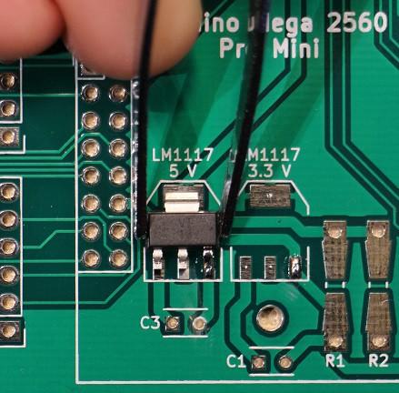 easier if you first thin one pad on the PCB