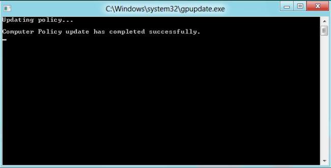 The Command window opens (Figure 13). The message Computer Policy update has completed successfully is your notification that Windows has successfully disabled Fast User Switching.