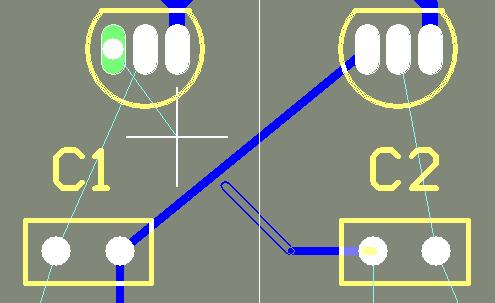 4. Position the cursor over the bottom-most pad on the connector Y1. Left-click or press ENTER to anchor the first point of the track. 5. Move the cursor towards the bottom pad of the resistor R1.