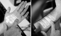 you to touch your skin and control a computer. He shows examples, combined with a pico projector, of dialing a phone number on your hand, etc. www.chrisharrison.