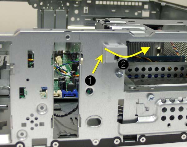 6. Press the tab (1) on the left side of the button assembly, rotate the assembly from left to right (2), and then pull the assembly from the chassis while threading the wire through the hole in the
