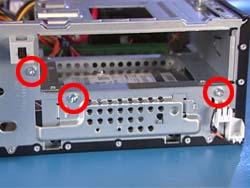 Remove the optical drive (Removing the Optical Drive on page 113). 6. Disconnect the power cable and data cable from the back of the hard drive. 7.