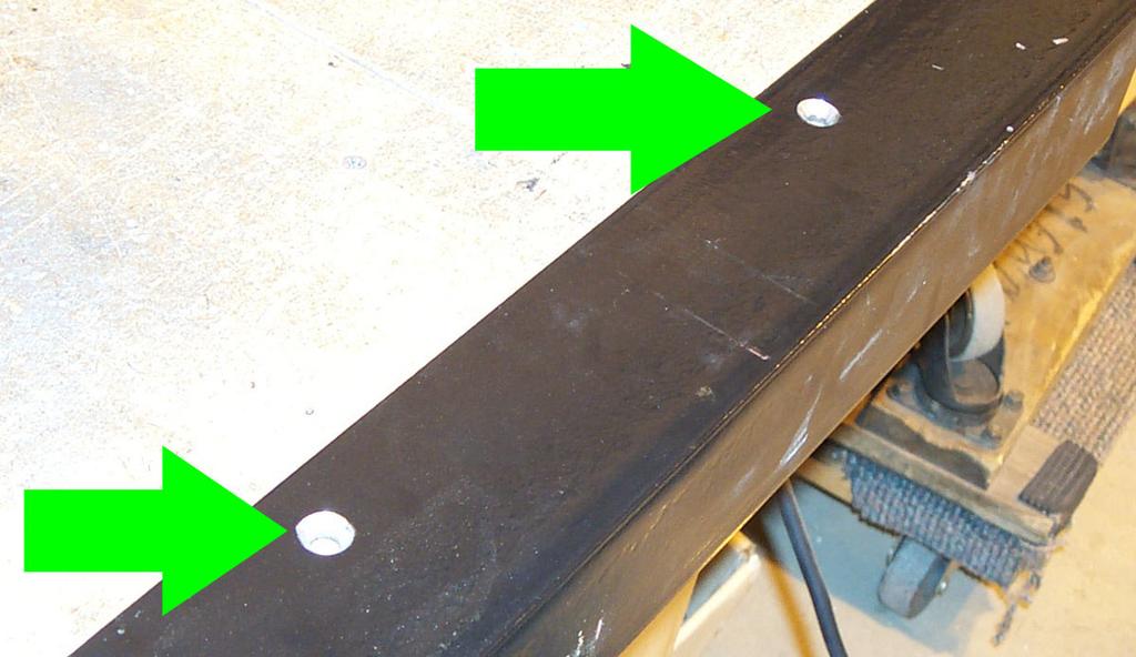 Installing the Display Bracket: 1. Remove the two lock nuts that hold the locking lever to the fence. Place the display bracket flush with the side of the fence, aligning the holes in the two parts.