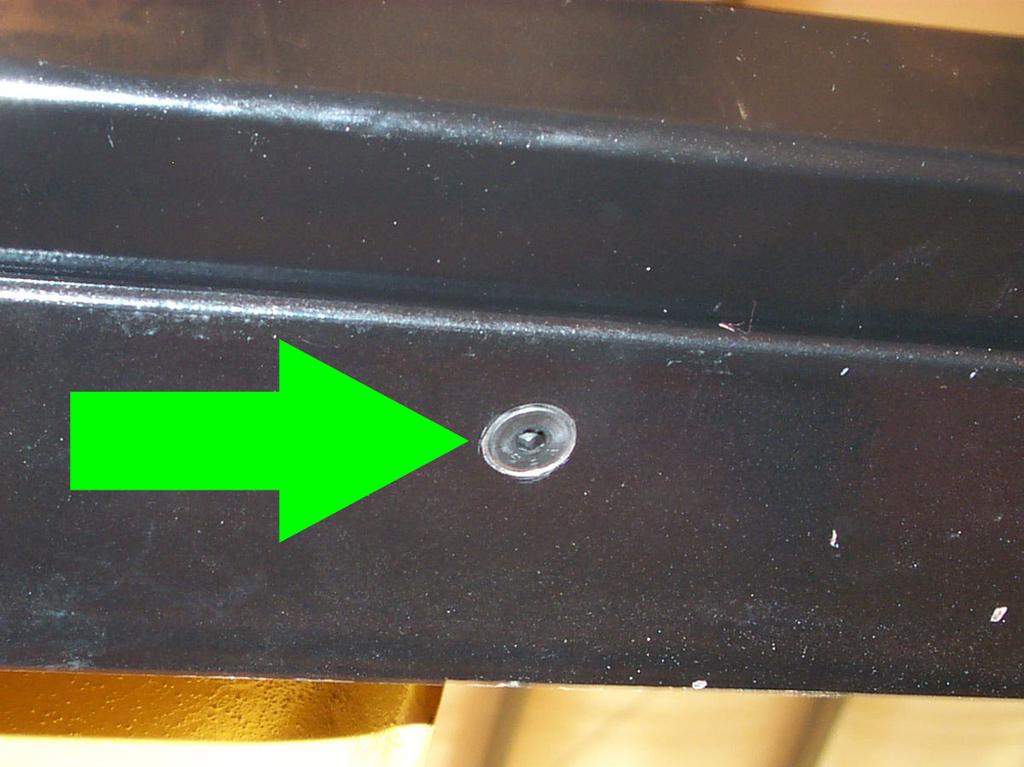 Remove the two screws on the front of the display housing and set them aside. 2. Pull the cover off the base. 3.