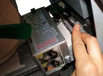 2) To take out a jammed paper in front of transport path, lift up the transparent window guide and remove the jamming receipt carefully.