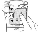 Print Head Pinch Roller Figure 4 4. Press firmly until cassette clicks into place. Make sure label and ribbon are positioned correctly. 5. Close the label cassette door and press to turn on the power.