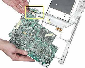 4. Lifting the logic board at the back ports, tilt up the logic board to remove it from the frame. 5.