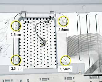 7. If an AirPort Extreme Card is not installed, unlatch the flexible wire bracket to release the AirPort antenna cable. 8. Remove the four screws that secure the RAM shield.