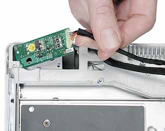 Remove the DC-in board from the computer assembly. 7.