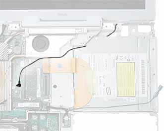 4. Carefully route the AirPort antenna cable out from under the optical drive. 5.