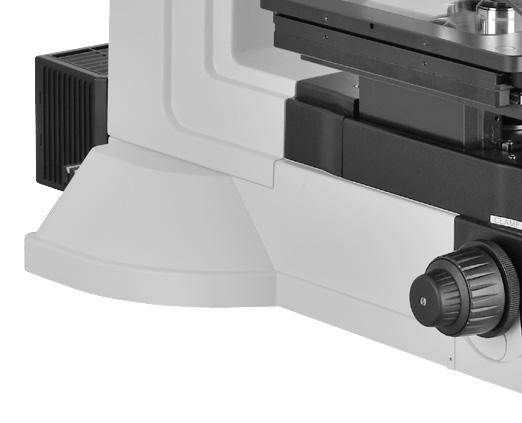 the left side of the microscope arm. You can find two click-stop positions as you place a filter slider in a slot.