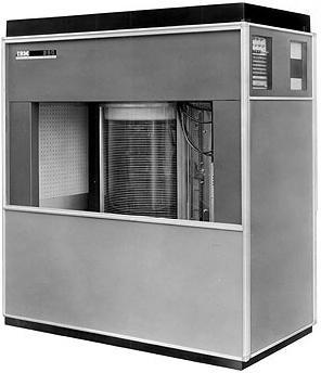 Here is an early picture of the RAMAC, taken from the IBM archives [R100]. It is the same type of unit as is pictured in chapter 1 of this textbook.