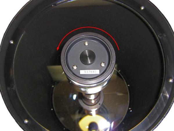 4) Unthread the retaining ring from the secondary mirror holder as shown below. 5) Carefully remove the secondary mirror assembly from the front of the telescope.