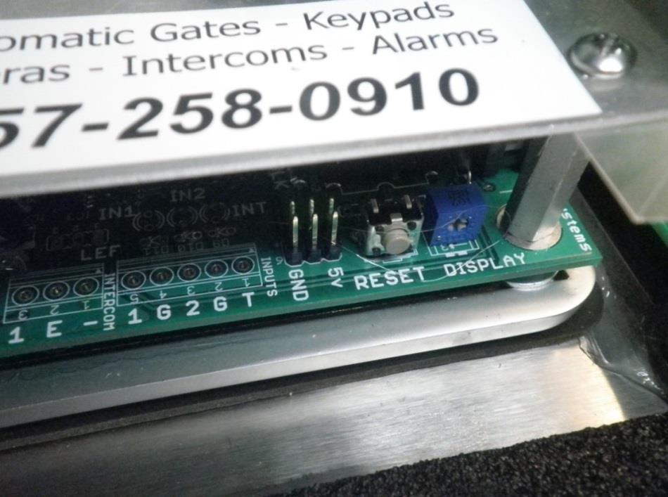 If you are using a card reader, you can connect it to the keypad controller board. The connector is located on the left side.