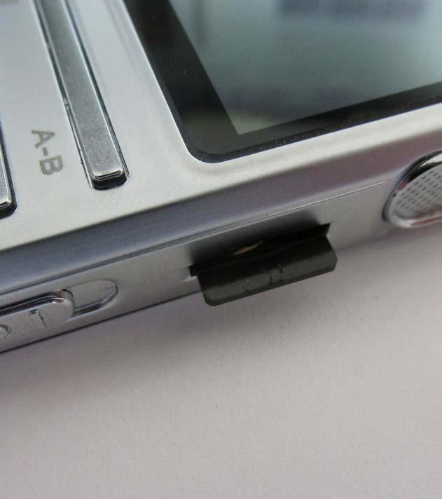 With the screen of the recorder facing UP, the SD card will be inserted with the Gold connectors facing UP. See the photo below. 2.