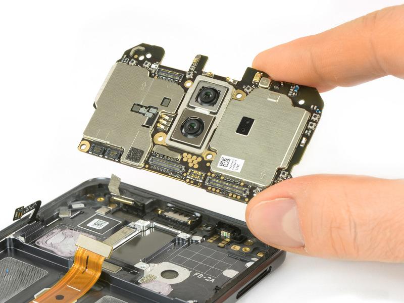 then easily lift out the motherboard with the dual camera system.