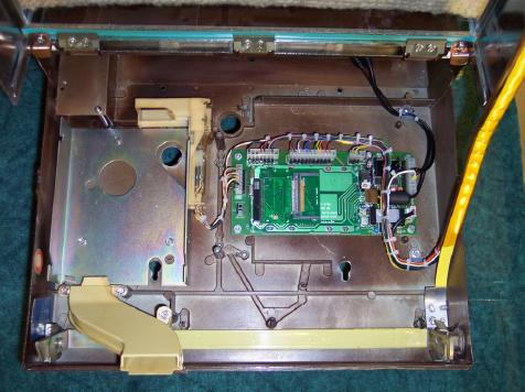 Install New Wire Harness to Back Panel Mounting the JCU player board. Insert nylon spacers, position the MP3 player unit, mount into place using four nuts.