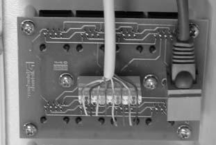 4. Terminate the incoming CAT5e wire from the NID to the 110-style punch down block on the rear of the module.