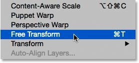 make sure "Layer 1" is selected in the Layers panel, then go up to the Edit menu at the top of the screen and choose Free Transform, or press Ctrl+T (Win) /