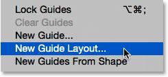 Go up to the View menu at the top of the screen and choose New Guide Layout: Going to View > New Guide Layout.