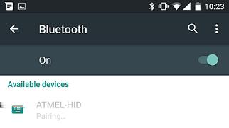 On the mobile phone, enable Bluetooth in the Settings page to scan for the devices. ATMEL-HID appears among the list of scanned devices. Select ATMEL-HID to connect to the supported platform device.