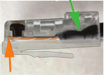 Make sure the sheath of the Ethernet cable extends into the plug by about 1/2" and will be held in place by the crimp (see green arrow). 6. Crimp the plug onto the cable using the crimper tool. 7.